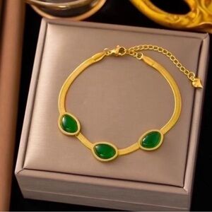 Elegant Gold and Green Bracelet